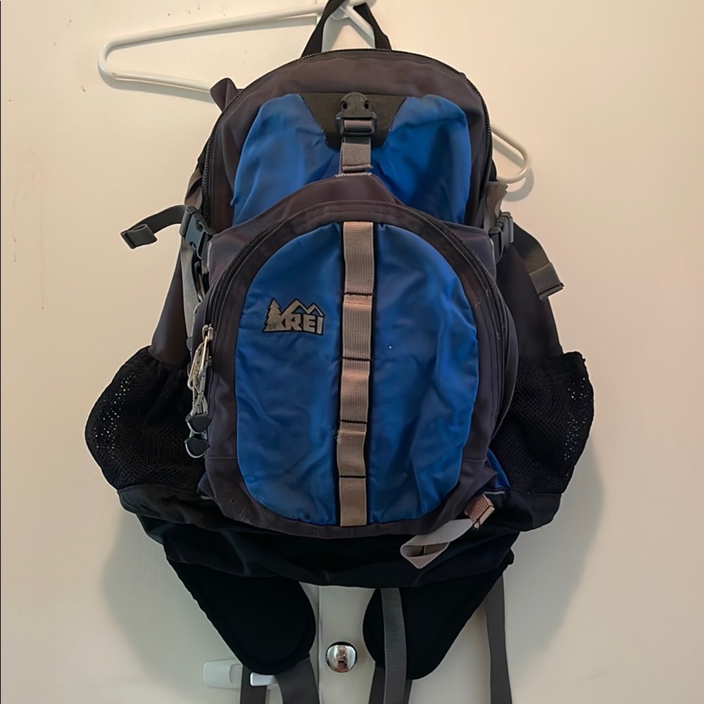 REI Blue and Black daypack with Padded Straps and Durable Design